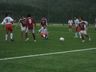 岡山県学生サッカーリーグ試合の写真